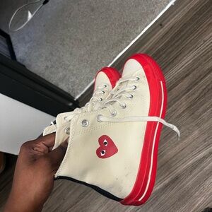 High-Top converse Sneakers with Red Soles